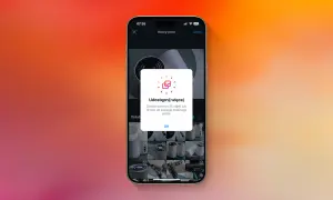 Ekran telefonu z powiadomieniem "Udostępnij więcej" na Instagramie, informującym o limicie 20 zdjęć.