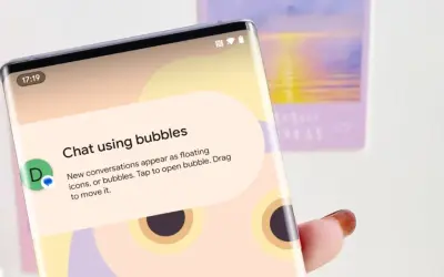 Jak włączyć dymki czatu na Messengerze na iPhonie? Ekran telefonu pokazuje instrukcję "Chat using bubbles", wyjaśniającą jak włączyć pływające okienka.