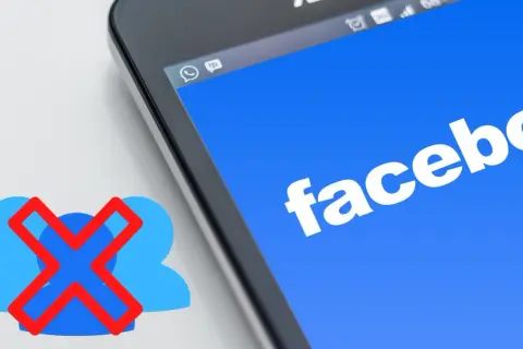 Chcesz wiedzieć, jak usunąć znajomego z Facebooka? Ikona z przekreślonymi ludzikami obok ekranu telefonu z logo Facebooka sugeruje tę czynność.