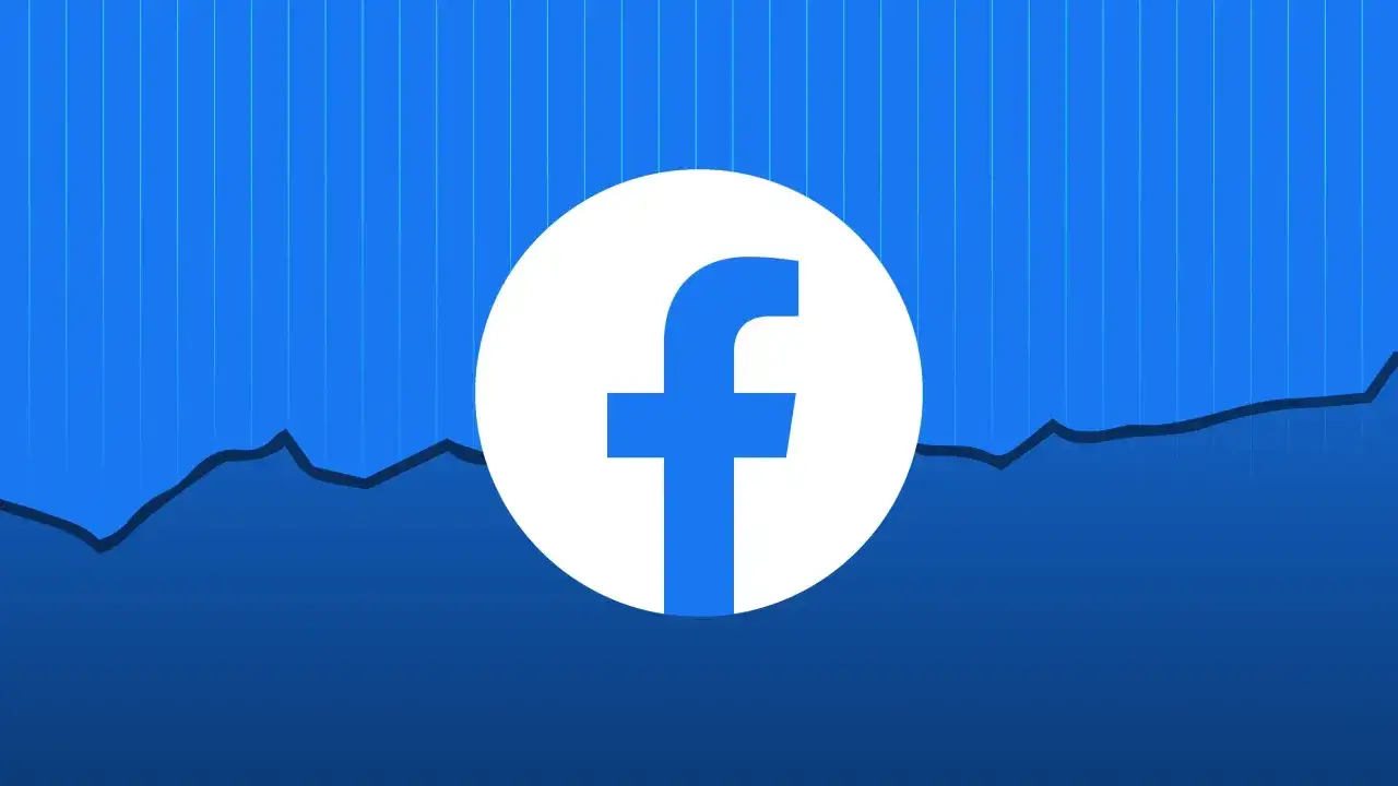 Ikona Facebooka na tle wykresu. Dowiedz się, jak zawiesić konto na FB, gdy potrzebujesz przerwy od mediów społecznościowych.
