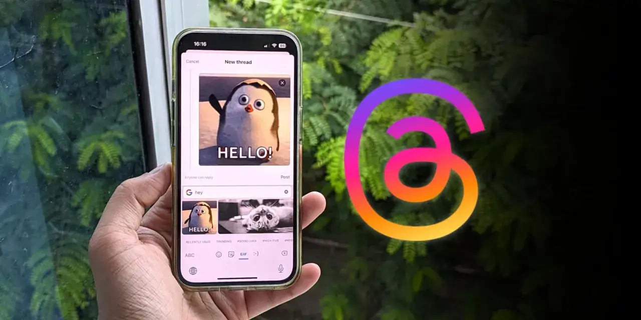 Jak publikować gify na Instagramie? Na ekranie telefonu widać okno tworzenia wątku z zabawnym gifem z pingwinem.