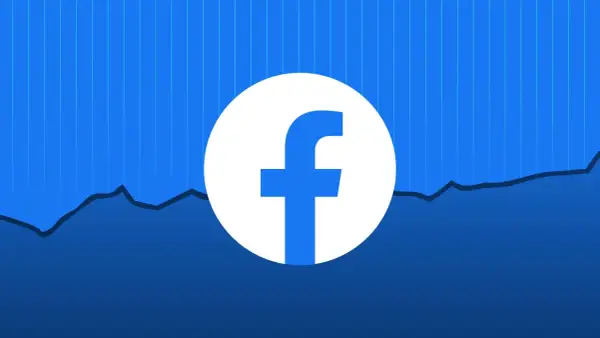 Ikona Facebooka na tle wykresu. Dowiedz się, jak zawiesić konto na FB, gdy potrzebujesz przerwy od mediów społecznościowych.